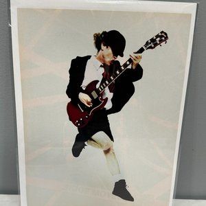 Angus Young of AC/DC - Music Print Ad Photo - 2009